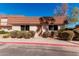 Front exterior view of a cozy townhome with well-maintained landscaping and inviting curb appeal at 1517 E Dunbar Dr, Tempe, AZ 85282