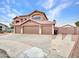 Charming home featuring a three-car garage, neutral paint, and low-maintenance desert landscaping at 15819 W Ripple Rd, Goodyear, AZ 85338