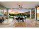 Backyard patio with a dining table overlooking the pool and desert landscape at 16908 S 31St Ln, Phoenix, AZ 85045