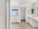 Elegant bathroom with a soaking tub and vanity with sink at 1726 E Cortez Dr, Casa Grande, AZ 85122