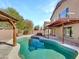 Backyard pool and spa, complete with an outdoor gazebo at 1726 E Cortez Dr, Casa Grande, AZ 85122