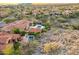 Residential pool featuring a jacuzzi with mature trees and desert landscape views at 18683 N 101St Pl, Scottsdale, AZ 85255