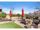 Outdoor living space with a pool, comfortable seating, and fire pit perfect for entertaining at 18683 N 101St Pl, Scottsdale, AZ 85255