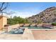 Resort-style pool and spa features a water feature and offers an inviting space for outdoor relaxation and entertainment at 18683 N 101St Pl, Scottsdale, AZ 85255