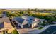 An aerial view of this home shows a meticulously maintained roof and efficient solar panel installation at 1925 E La Costa Dr, Gilbert, AZ 85298