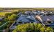 Aerial view of a house showing roof-mounted solar panels, backyard pool, and artificial grass at 1925 E La Costa Dr, Gilbert, AZ 85298