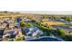 Beautiful aerial view of the landscaped home, highlighting its roof, driveway, and surrounding neighborhood at 1925 E La Costa Dr, Gilbert, AZ 85298