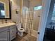 Bathroom featuring a shower-tub combo with a decorative shower curtain at 1925 E La Costa Dr, Gilbert, AZ 85298