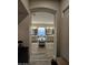 Luxurious bathroom featuring dual vanities, a soaking tub, and wood-look tile flooring at 1925 E La Costa Dr, Gilbert, AZ 85298