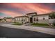 Stunning single-story home featuring stone accents, manicured landscaping, and a barrel roof at 1925 E La Costa Dr, Gilbert, AZ 85298