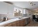 Bright kitchen with stainless steel appliances, subway tile backsplash, and ample counter space at 2016 N Pennington Dr, Chandler, AZ 85224