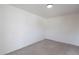 A bright room featuring concrete floors and white walls at 2016 N Pennington Dr, Chandler, AZ 85224