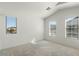 Bedroom with a vaulted ceiling and three windows providing plenty of natural light at 2150 E Bell Rd # 1134, Phoenix, AZ 85022