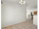 Bright dining area featuring neutral tile floors and modern light fixture at 2150 E Bell Rd # 1134, Phoenix, AZ 85022