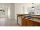 Well-lit living area with tile flooring, large windows, and a neutral color palette at 2150 E Bell Rd # 1134, Phoenix, AZ 85022