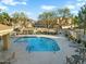 A community pool surrounded by ample seating areas and manicured landscaping at 2150 E Bell Rd # 1134, Phoenix, AZ 85022