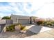 Charming single-story home featuring a spacious driveway, desert landscaping, and a welcoming entrance at 2169 E Alameda Dr, Tempe, AZ 85282