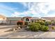 Charming single-story home with well-maintained desert landscaping and a welcoming covered entrance at 2169 E Alameda Dr, Tempe, AZ 85282