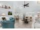 Bright and spacious living room featuring tile floors, white walls, and a seamless flow to the dining area, perfect for entertaining at 2169 E Alameda Dr, Tempe, AZ 85282