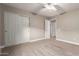 Neutral bedroom with carpet and closet featuring sliding doors at 2633 E Amber Ridge Way, Phoenix, AZ 85048