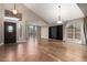 Bright living room with vaulted ceilings, hardwood floors, and large windows at 2633 E Amber Ridge Way, Phoenix, AZ 85048