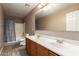 This bathroom features a dual sink vanity and a shower-tub combination at 3127 W Apollo Rd, Phoenix, AZ 85041