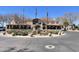 Well-maintained clubhouse entrance with fountain, landscaping and ample parking at 3131 E Legacy Dr # 2105, Phoenix, AZ 85042