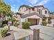 Charming two-story home features a private entrance, desert landscaping, and a two-car garage at 3131 E Legacy Dr # 2105, Phoenix, AZ 85042