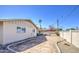 Spacious backyard with potential for landscaping and outdoor activities under a clear blue sky at 3210 W Belmont Ave, Phoenix, AZ 85051