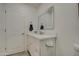 Bathroom featuring a vanity with solid surface countertop and large mirror at 3210 W Belmont Ave, Phoenix, AZ 85051