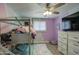 Charming ' bedroom featuring a bunk bed, TV, and playful decor at 3210 W Belmont Ave, Phoenix, AZ 85051