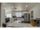 Bright kitchen with stainless steel appliances and shaker cabinets with eat-in kitchen at 3210 W Belmont Ave, Phoenix, AZ 85051