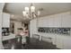 View of the eat-in kitchen area featuring shaker cabinets and granite countertops at 3210 W Belmont Ave, Phoenix, AZ 85051