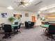 Spacious card room with multiple tables, chairs, and ample lighting at 3330 E Main St # 323, Mesa, AZ 85213