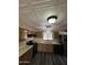 Cozy kitchen with wood cabinets, stainless steel appliances, and a window with natural light at 3330 E Main St # 323, Mesa, AZ 85213