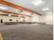 Large meeting room featuring wooden beams, neutral carpet and rows of chairs at 3330 E Main St # 323, Mesa, AZ 85213