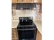 Close-up of Samsung black stovetop with hood at 3330 E Main St # 323, Mesa, AZ 85213