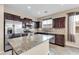 Well-equipped kitchen with stainless steel appliances and granite countertops at 3443 S California St, Chandler, AZ 85248