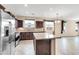 Spacious kitchen featuring stainless steel appliances, granite countertops, and a large island at 3443 S California St, Chandler, AZ 85248