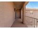 Narrow, covered balcony with a railing on the right side at 3891 E Melrose St, Gilbert, AZ 85297