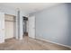 Bright bedroom with a closet, carpeted floor and light blue painted walls at 3891 E Melrose St, Gilbert, AZ 85297