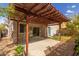 Backyard covered patio with beautiful pergola and stone landscape at 3891 E Melrose St, Gilbert, AZ 85297