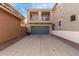 Two-car garage with light-blue doors and matching trim at 3891 E Melrose St, Gilbert, AZ 85297