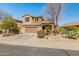 Charming two-story home with desert landscaping and a two car garage at 39526 N White Tail Ln, Anthem, AZ 85086