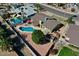 Aerial view of a home with a swimming pool, patio, shed, and well-defined property lines at 4201 W Brown St, Phoenix, AZ 85051