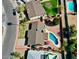 Aerial view of property showing backyard with pool, shed, patio, and outlined property lines at 4201 W Brown St, Phoenix, AZ 85051