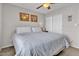 Cozy bedroom featuring a comfortable bed, neutral decor, and ample closet space at 4201 W Brown St, Phoenix, AZ 85051