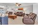 Spacious living room with leather furniture, bright lamps and stylish decor at 4201 W Brown St, Phoenix, AZ 85051