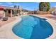 Sparkling pool and back yard, perfect for outdoor entertaining and relaxation on a sunny day at 4201 W Brown St, Phoenix, AZ 85051