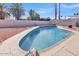 Refreshing private backyard swimming pool with a clean, well-maintained deck area at 4201 W Brown St, Phoenix, AZ 85051